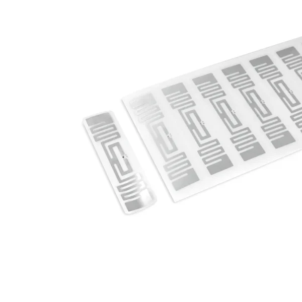 Example of the UHF RFID wet inlay with Impinj Monza R6-P chip applied on cartons, plastics, and wood