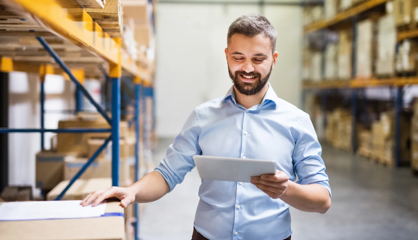 RFID product recall tracking with warehouse worker managing inventory data
